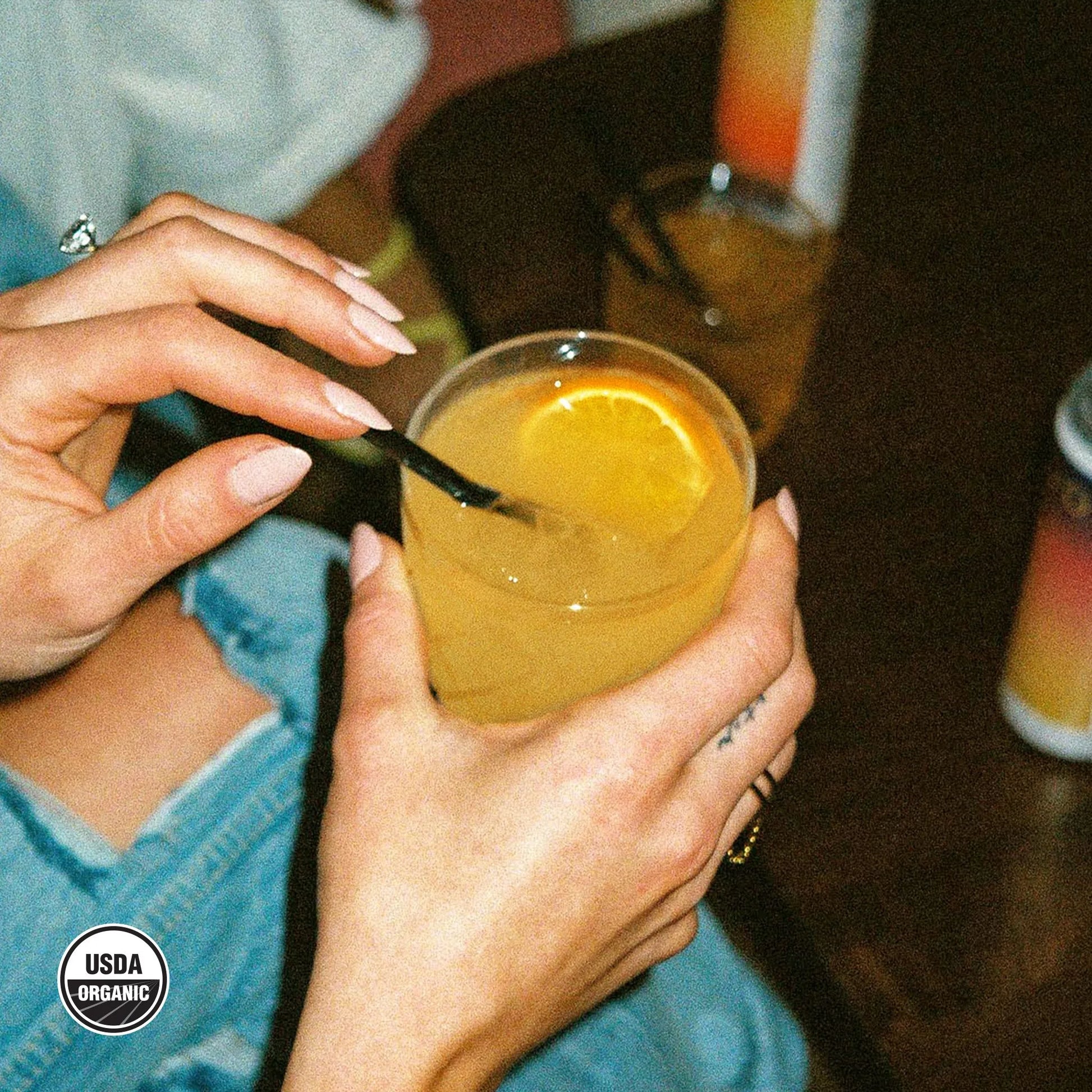 a glass of peach mango