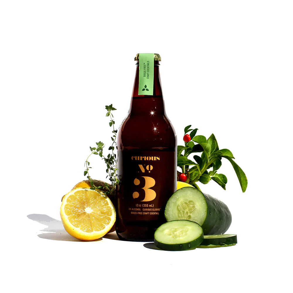 a bottle of no 3 surrounded by fruit