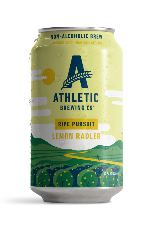 athletic brewing co's ripe pursuit, lemon radler flavor. on the can is a simplistic illustration of a feild of lemon trees with a light yellow sky and clouds