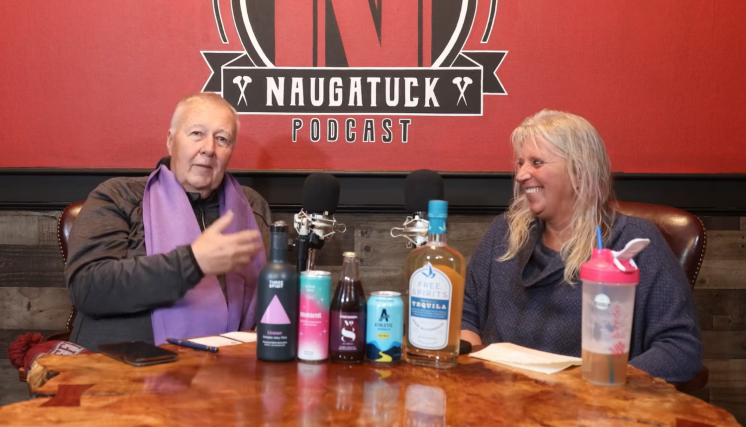 a picture of bobbie and mayor pete hess talking on the tough as nails podcast