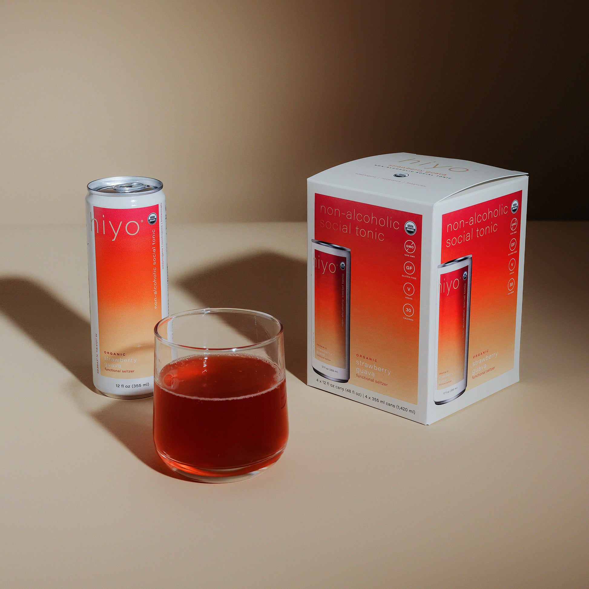 a can, box and glass of strawberry guava