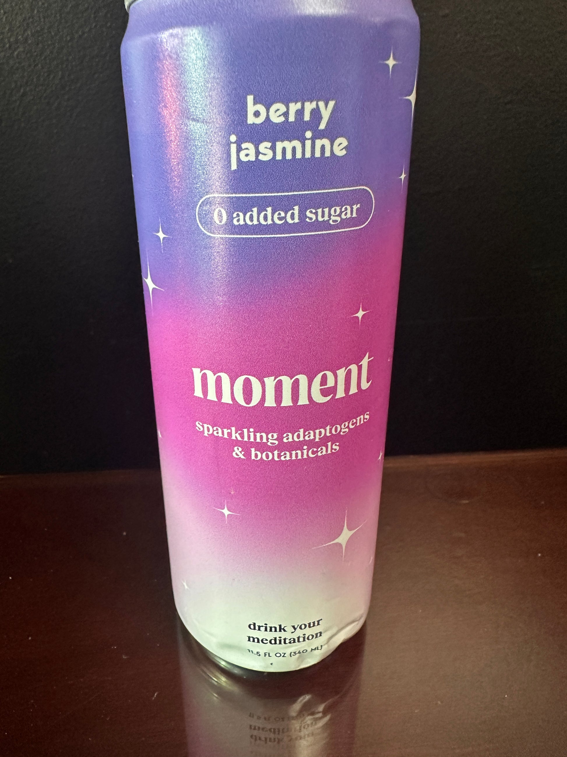 a can of moment's sparkling berry jasmine botanical water