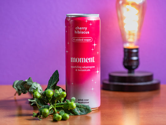 a can of moment's sparkling cherry hibiscus botanical water