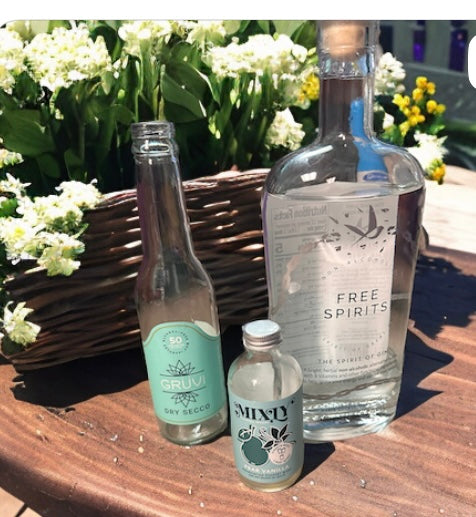 a display of gruvi's dry secco, mixly's pear vanilla, and free spirit's gin