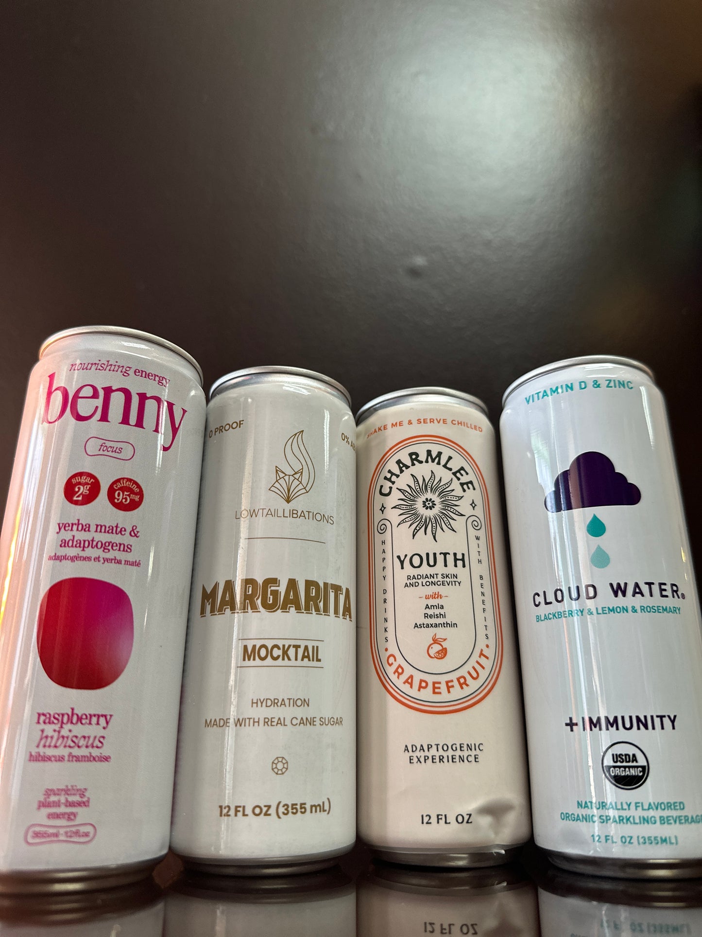 four drinks displayed next to eachother, all of them are white