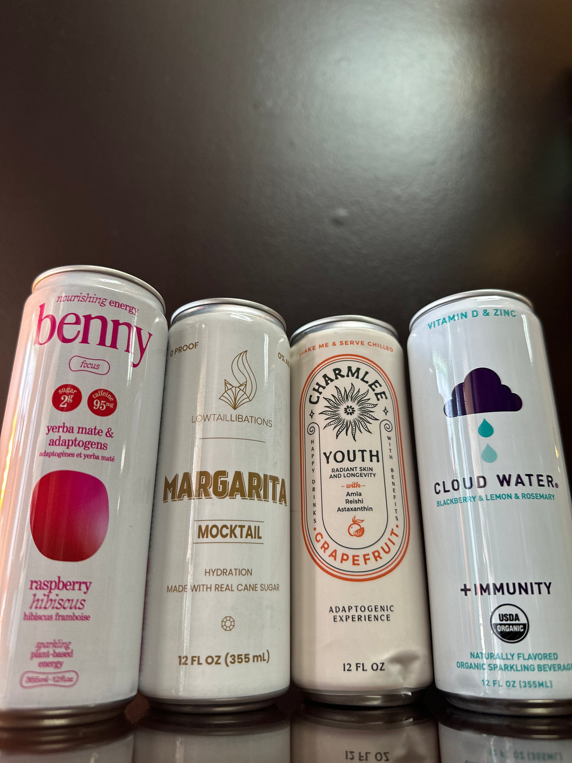 four drinks displayed next to eachother, all of them are white